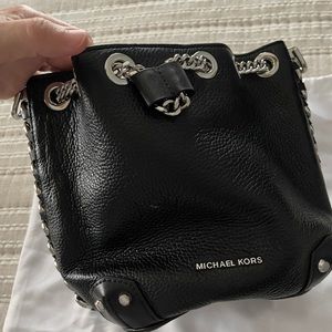 Michael Kors black leather medium sized bucket bag. Well loved.